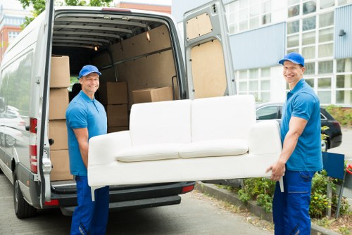 Removal team planning a move in a Lambeth residential street