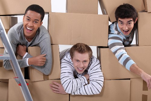 House removal team planning a move in a Lambeth street