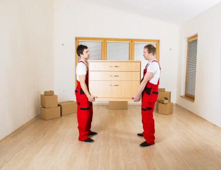 A local moving team handling furniture loading in Lambeth near busy South London roads